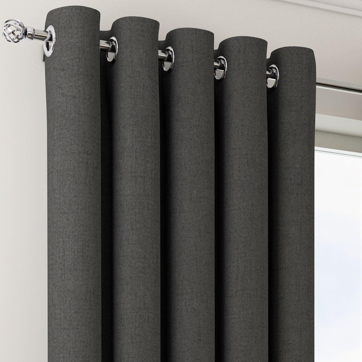 Orion Thermal Blackout Lined Eyelet Curtains Charcoal Eyelet Curtains Filigree   